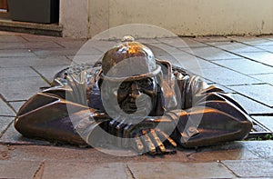 Bronze sculpture called man at work in Bratislava, Slovakia