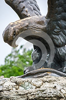 The bronze sculpture of an eagle fighting a snake on a Mashuk mo