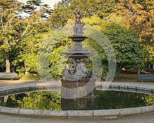 Bronze sculpture and fountain in the Crystal Palace Gardens in Porto, Portugal.