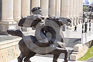 Bronze sculpture of a furious man on a horse in downtown Skopje, Macedonia