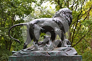 Bronze sculpture of group of lions - lion, dying lioness, Berlin, Germany