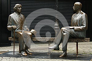 Oscar Wilde & Eduard Vilde on Galway street. Ireland. photo