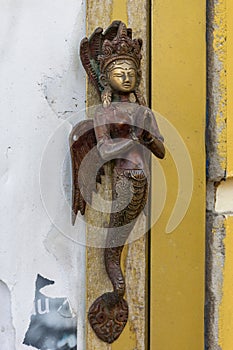 Bronze sculpture of mermaid godess.