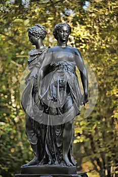 A bronze sculpture of the Three Graces photo
