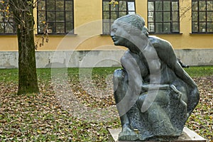 Bronze sculpture of the woman photo