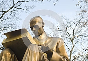 Bronze sculpture of a writer and journalist