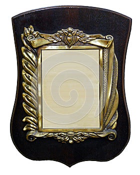 A bronze Sign shield on the wall
