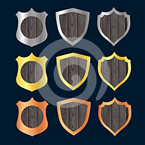 Set of game bronze, silver, gold shields, cartoon medieval armor of metal and wood decorated. Knight ammo, iron or