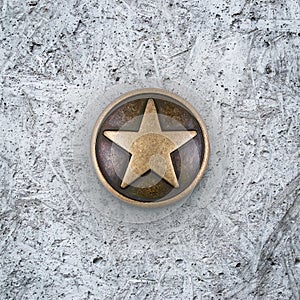 Bronze star on cement background