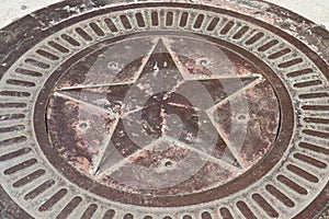 Bronze star with patina photo