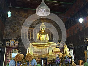 Bronze statue of Buddha and disciples in Temple of Bells, Bangkok