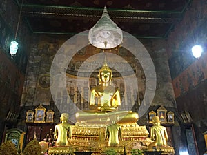 Bronze statue of Buddha And 3 disciples in Temple of Bells, Bangkok photo