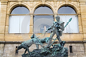 Bronze statue dog handler at Konopiste castle, Czech Republic