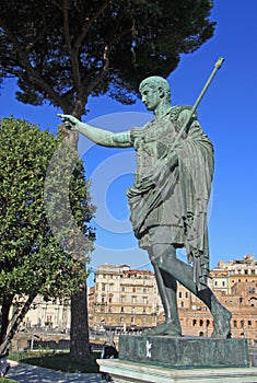 Bronze statue of emperor Caesar Augustus on Via dei Fori Imperiali, Rome, Italy