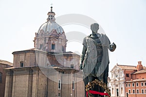 Bronze statue of emperor Julius Caesar over Temple of Venus Genetrix in Rome