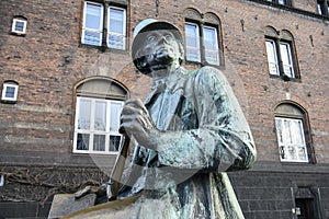 Bronze statue of Hans Christian Andersen at Copenhagen City Hall square, Denmark. February 2020