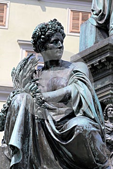 Bronze statue in Hauptplatz, Graz, Austria photo