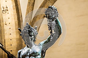 Bronze statue of Perseus holding the head of Medusa in Florence, made by Benvenuto Cellini in 1545