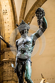 Bronze statue of Perseus holding the head of Medusa in Florence, made by Benvenuto Cellini in 1545