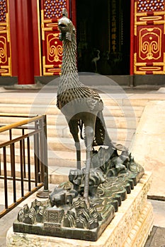 Bronze statue of a phoenix bird in the Summer Imperial Palace. Beijing, China