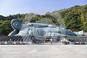 The bronze statue of reclining Buddha state at Nanzoin Temple in Sasaguri, Fukuoka, Japan. This is the bigest lying statue in the