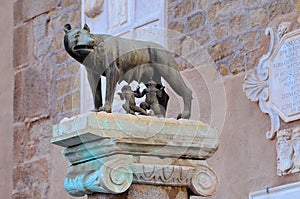 Bronze statue of Romulus and Remus symbol of city feeding from She wolf beside Palazzo Senatorio on Capitol, Rome Italy