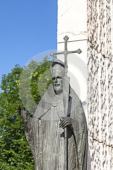Bronze statue of St. Wojciech on Altar Three Millennia, Skalka, Krakow, Poland photo
