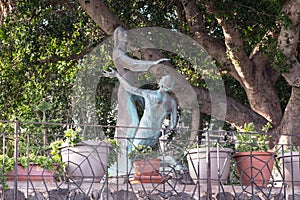 Bronze statue standing in the courtyard of the Church of the Primacy of St. Peter, located on the shores of the Sea of Galilee in