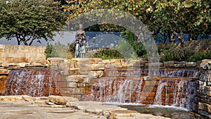 Bronze statue titled `A Mother`s Tears` by Paul Tadlock in the Veteran`s Memorial Park in Irving, Texas.