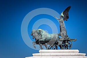 Bronze statue of Winged Victory on the top of King Vittorio Emanuele II monument, also know as Vittoriano