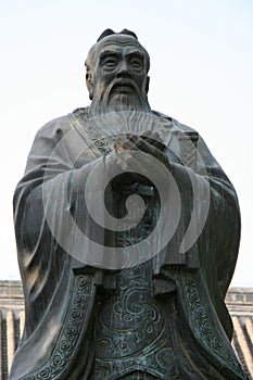 bronze statue of a wise old man (confucius ?) at the imperial college in beijing (china)