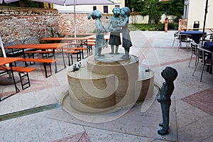 Bronze statues and restaurant