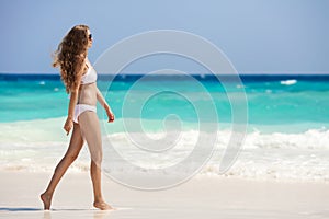 Bronze Tan Woman At Tropical Beach