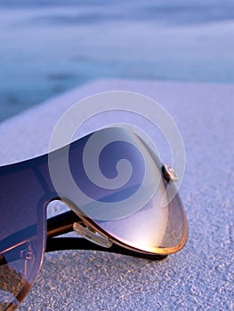 Bronze Tinted Sunglasses Reflecting Sunset