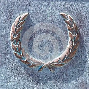 Bronze wreath, detail of the monument, close-up.