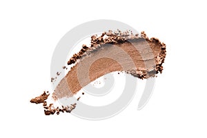 Bronzer, eye shadow swatch smear smudge isolated on white background. Brown makeup powder texture photo