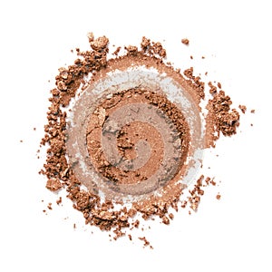 Bronzer or eyeshadow swatch. Crashed brown color shimmer face powder texture photo