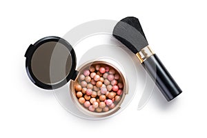 Bronzing pearls and makeup brush