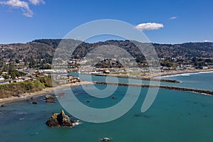 Brookings Oregon coastline with blue green ocean water photo