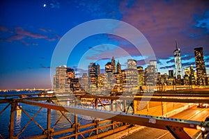 Brooklyn Bridge and car traffic at night, New York City