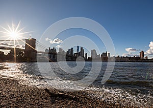 Brooklyn Bridge, East River and Lower Manhattan in Background. NYC Skyline. Dumbo. USA