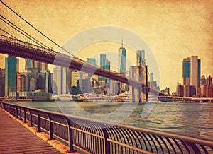 The Brooklyn Bridge with Lower Manhattan in the background at  the day-time, New York City, United States. Photo in retro style. A