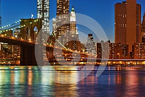 Brooklyn Bridge with lower Manhattan skyline at night