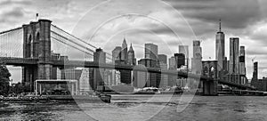 Brooklyn Bridge with Manhattan skyline in the background in black and white