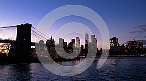 Brooklyn Bridge and Manhattan Skyline at sunset - New York, USA