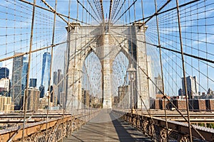 Brooklyn Bridge in New York City skyline of Manhattan with World Trade Center skyscraper in the United States