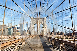 Brooklyn Bridge in New York City skyline of Manhattan with World Trade Center skyscraper in the United States