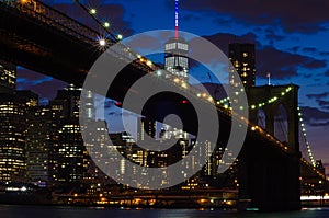 Brooklyn Bridge over East River at night