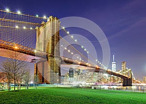 Brooklyn Bridge over East River at night in New York City Manhattan