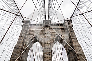 Brooklyn bridge rainy day. Close Up view of Brooklyn bridge in New York City.